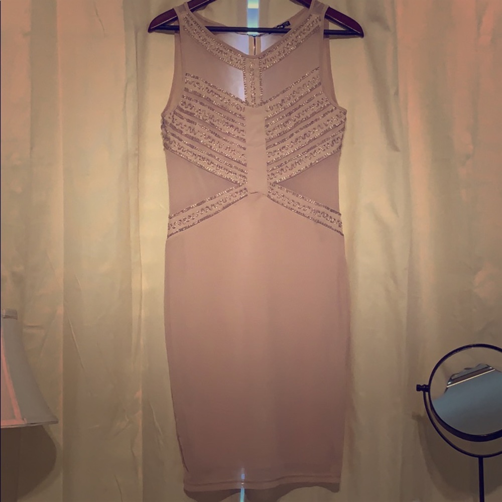 Pink/nude sleeveless TFNC London fitted dress.